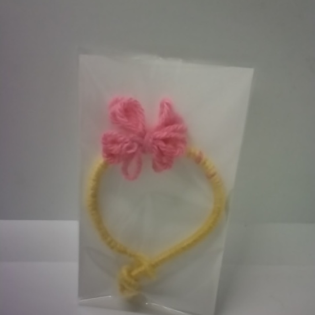 Lorena Espinoza Design Pink Bow Yellow Bracelet